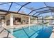 Stunning screened pool and patio, a perfect oasis for relaxation and recreation at 2970 Cascabel Ter, North Port, FL 34286