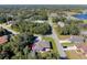 Aerial view of a single-Gathering home with a large backyard and surrounding neighborhood at 3008 Yeadon Ter, North Port, FL 34286