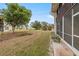 Landscaped backyard with view of building exterior at 311 Garvin St # 411B, Punta Gorda, FL 33950