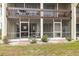 Exterior view of building showing multiple screened patios at 311 Garvin St # 411B, Punta Gorda, FL 33950