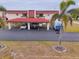 Condo building with carport parking and tropical landscaping at 311 Garvin St # 411B, Punta Gorda, FL 33950