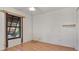 Simple bedroom with wood flooring and a window at 3128 Ponce De Leon Blvd, North Port, FL 34291