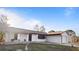 Front view of house showcasing a well-maintained lawn at 3128 Ponce De Leon Blvd, North Port, FL 34291