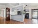 Kitchen with light gray cabinets and black appliances at 3128 Ponce De Leon Blvd, North Port, FL 34291