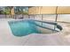 Clean and refreshing kidney-shaped pool in a screened enclosure at 3128 Ponce De Leon Blvd, North Port, FL 34291