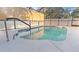 Refreshing kidney-shaped pool with screened enclosure at 3128 Ponce De Leon Blvd, North Port, FL 34291