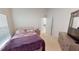 Cozy bedroom with double bed, nightstand, and dresser at 317 Monaco Dr # 7, Punta Gorda, FL 33950