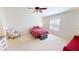 Spacious bedroom with a queen-size bed and an armchair at 317 Monaco Dr # 7, Punta Gorda, FL 33950