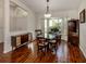 Bright dining room with hardwood floors and built-in hutch at 3341 Briant St, North Port, FL 34287