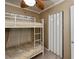 Bedroom with a bunk bed and bi-fold closet doors at 350 Duxbury Ave, Port Charlotte, FL 33952