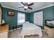 Bright bedroom with a double bed and ceiling fan at 350 Duxbury Ave, Port Charlotte, FL 33952