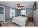 Bright bedroom with a double bed and gray walls at 350 Duxbury Ave, Port Charlotte, FL 33952