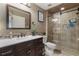 Modern bathroom with a large glass shower and updated vanity at 3953 Vehlin St, North Port, FL 34286