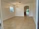 Bright dining room with tile floors and chandelier at 4269 River Bank Way, Port Charlotte, FL 33980