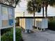 Community mailboxes with a bulletin board and landscaping at 4269 River Bank Way, Port Charlotte, FL 33980