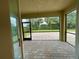 Spacious screened patio overlooking the backyard at 4269 River Bank Way, Port Charlotte, FL 33980