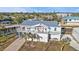 Aerial view of a waterfront home with a metal roof and detached garage at 4297 Nettle Rd, Port Charlotte, FL 33953