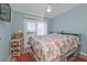 Bright bedroom with a comfortable bed and plenty of natural light at 4297 Nettle Rd, Port Charlotte, FL 33953