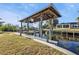 Covered boat dock with boat lift on the canal in a quiet neighborhood at 4297 Nettle Rd, Port Charlotte, FL 33953