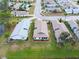 Aerial view of community, showing home's backyard at 616 Cherrywood Dr, Englewood, FL 34223