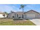 House exterior showcasing a well-maintained lawn and driveway at 638 Andros Ct, Punta Gorda, FL 33950