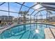 Relaxing screened pool and spa with water views at 638 Andros Ct, Punta Gorda, FL 33950