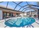 Inviting kidney-shaped pool with screened enclosure at 638 Andros Ct, Punta Gorda, FL 33950