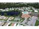 Community overview featuring pool, tennis courts, and clubhouse at 805 Manchester Ct, Englewood, FL 34223