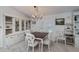 Charming dining area featuring a farmhouse table and chairs at 805 Manchester Ct, Englewood, FL 34223