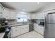 Well-equipped kitchen featuring stainless steel appliances at 805 Manchester Ct, Englewood, FL 34223