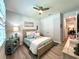 Cozy bedroom with double bed and wood flooring at 8117 Thruso Rd, Port Charlotte, FL 33981