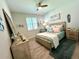 Light and airy bedroom with a queen-size bed, and plenty of natural light at 8117 Thruso Rd, Port Charlotte, FL 33981