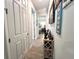 Light and bright hallway with linen closet at 8117 Thruso Rd, Port Charlotte, FL 33981