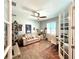 Home office with built-in shelving and French doors at 8117 Thruso Rd, Port Charlotte, FL 33981