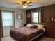 Cozy bedroom with a king-size bed and ample closet space at 939 Silver Springs Nw Ter, Port Charlotte, FL 33948