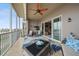 Relaxing screened balcony with outdoor furniture and water views at 95 N Marion Ct # 233, Punta Gorda, FL 33950