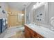 Clean bathroom with tub/shower combo and modern vanity at 95 N Marion Ct # 233, Punta Gorda, FL 33950