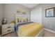 Cozy bedroom with a queen bed and built-in storage at 95 N Marion Ct # 233, Punta Gorda, FL 33950