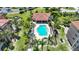 Resort-style pool with surrounding lounge chairs at 95 N Marion Ct # 233, Punta Gorda, FL 33950