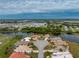 Aerial view of a single-Gathering home in a waterfront community at 10214 Windsong Rd, Punta Gorda, FL 33955