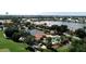Community overview, including pool, tennis courts, and homes at 10214 Windsong Rd, Punta Gorda, FL 33955