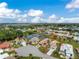 Aerial view of a single-Gathering home in a waterfront community at 10214 Windsong Rd, Punta Gorda, FL 33955