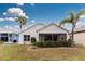 Charming home with a lush backyard and screened patio at 10214 Windsong Rd, Punta Gorda, FL 33955