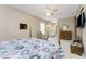 Bright bedroom with a comfortable bed and plenty of dresser space at 10214 Windsong Rd, Punta Gorda, FL 33955