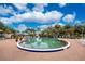 Sparkling community pool with surrounding patio and lounge chairs at 10214 Windsong Rd, Punta Gorda, FL 33955