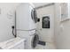 Stackable washer and dryer in a convenient laundry room at 10214 Windsong Rd, Punta Gorda, FL 33955