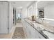 Elegant bathroom with double vanity and granite countertop at 115 Breakers Ct # 111, Punta Gorda, FL 33950