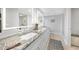 Modern bathroom with double vanity and granite countertop at 115 Breakers Ct # 111, Punta Gorda, FL 33950