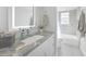 Clean bathroom with single vanity and tub shower combo at 115 Breakers Ct # 111, Punta Gorda, FL 33950