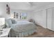 Comfortable bedroom with queen-size bed and closet at 115 Breakers Ct # 111, Punta Gorda, FL 33950